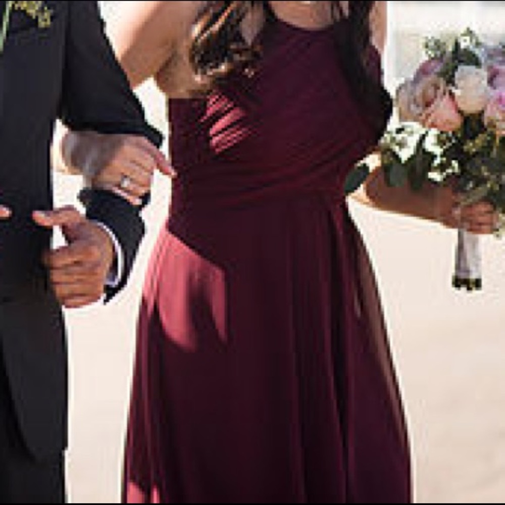 Long burgundy dress.
